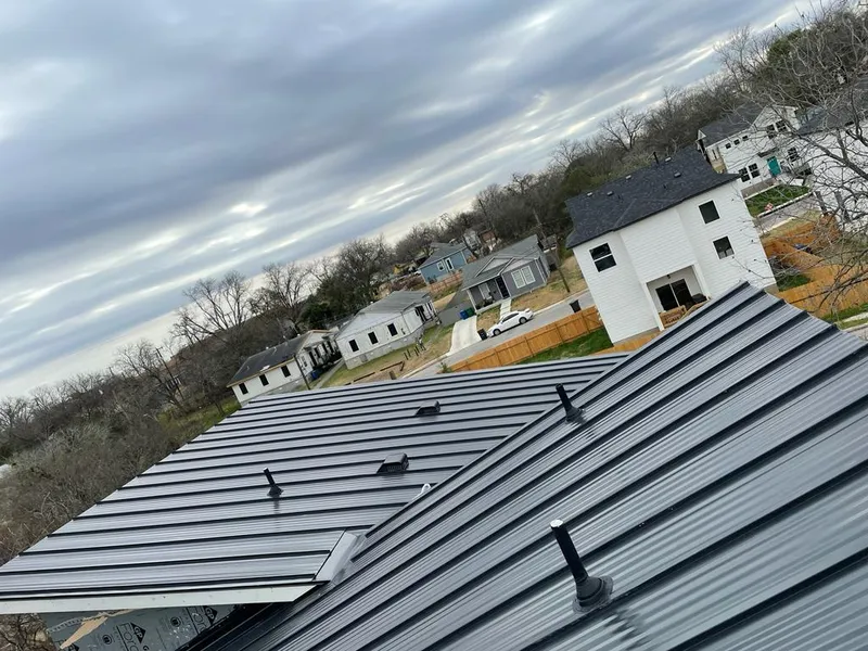 Standing seam metal roof panels with vents for Skylight Repair in Saratoga Springs